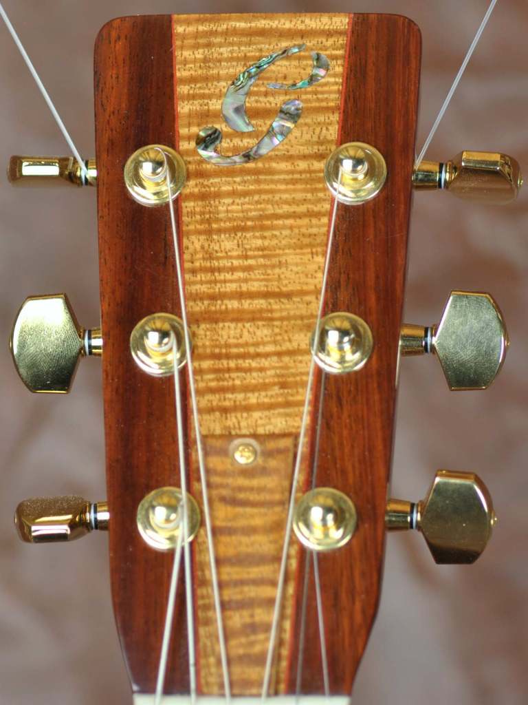 Triple 0 headstock with paduak and Koa